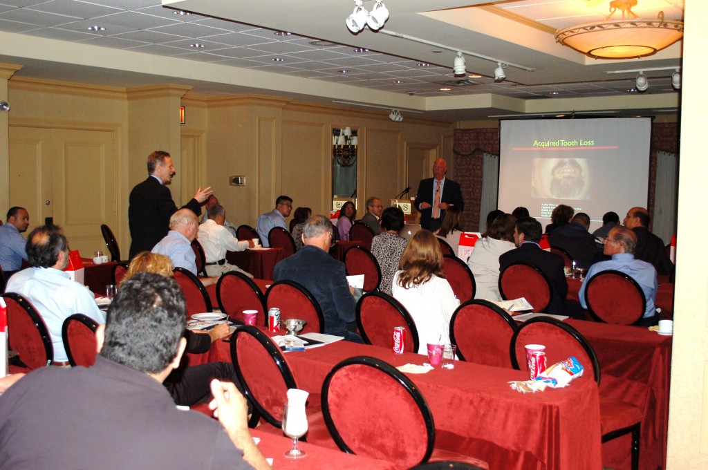 Dr. Fialkoff giving lectures on his Implant Certainty Training program